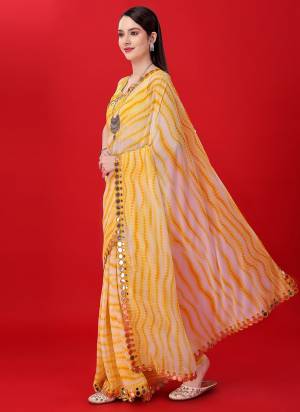 Garb These Party Wear Saree in Fine Colored.These Saree Are Georgette And Blouse is Art Silk Fabricated.Its Beautified With Designer Sabori Printed,Mirror Lace Border.