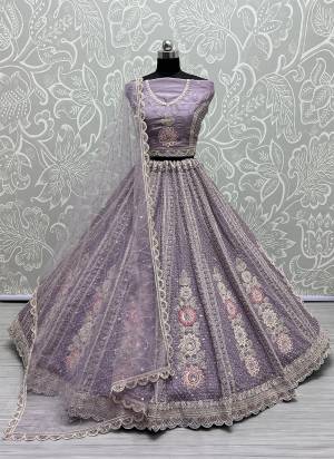 For A Fancy Designer Look,Grab These Lehenga Choli With Dupatta in Fine Colored.These Lehenga Are Net And Choli Are Organza And Dupatta Are Fabricated On Soft Net Pair.Its Beautified With Thread,Sequance Embroidery,Diamond Work.