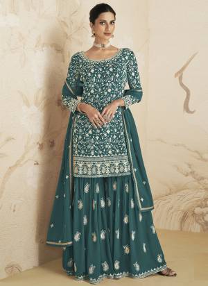 Garb These Designer Plazzo Suits in Fine Colored Pair With Dupatta.These Top And Dupatta Are Fabricated On Faux Georgette Pair With Faux Georgette Bottom.Its Beautified With Heavy Designer  Embroidery Work.