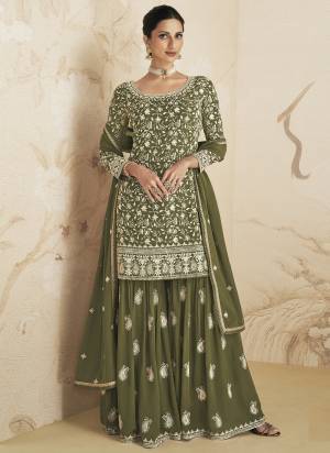 Garb These Designer Plazzo Suits in Fine Colored Pair With Dupatta.These Top And Dupatta Are Fabricated On Faux Georgette Pair With Faux Georgette Bottom.Its Beautified With Heavy Designer  Embroidery Work.