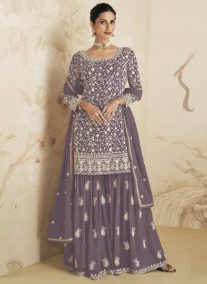 Garb These Designer Plazzo Suits in Fine Colored Pair With Dupatta.These Top And Dupatta Are Fabricated On Faux Georgette Pair With Faux Georgette Bottom.Its Beautified With Heavy Designer  Embroidery Work.