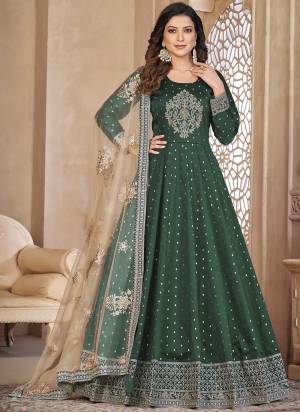 Grab These Anarkali Suit in Fine Colored Pair With Bottom And Dupatta.These Top Are Tafeta Butti And Dupatta Are Fabricated On Net Pair With Santoon Bottom.Its Beautified With Santoon Inner.Its Beautified With Designer Heavy Embroidery Work.