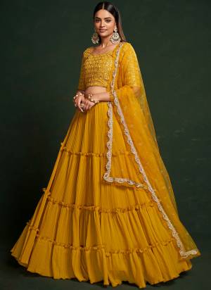 For A Designer Look,Grab These Lehenga Choli in Fine Colored.These Lehenga Are Faux Georgette And Dupatta Are Fabricated On Net Pair With Faux Georgette Blouse.Its Beautified With Thread,Sequance Embroidery Work.