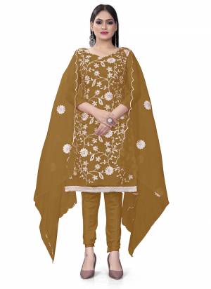 Garb This Suits In Lovely Color.Its Pretty Top Is Organza Silk Based Paired Bottom Santoon And Organza Silk Fabricated Dupatta Are Designer Floral Embroidery Work. Which Gives An Attractive To The Dress.