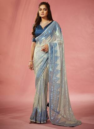 Garb These Fancy Party Wear Saree in Fine Colored.These Saree Are Georgette And Blouse is Mono Banglori Fabricated.Its Beautified With Designer Sequance Embroidery Work.