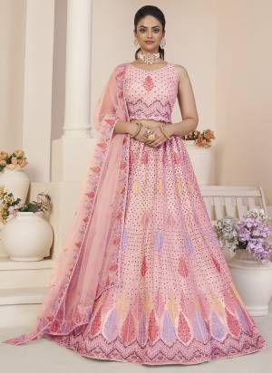 For A Fancy Designer Look,Grab These Lehenga Choli With Dupatta in Fine Colored.These Lehenga And Choli Are Net And Dupatta Are Fabricated On Net Pair.Its Beautified With Designer Thread,Sequance Embroidery Work.