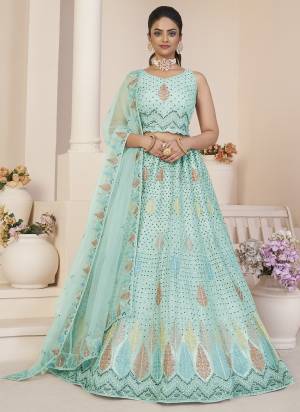 For A Fancy Designer Look,Grab These Lehenga Choli With Dupatta in Fine Colored.These Lehenga And Choli Are Net And Dupatta Are Fabricated On Net Pair.Its Beautified With Designer Thread,Sequance Embroidery Work.