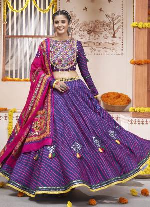 Attrective These Navratri Special Lehenga Choli in Fine Colored.These Lehenga And Blouse Are Rayon And Dupatta Are Fabricated On Cotton.Its Beautified With Designer Embroidery Work.