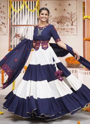 Attrective These Navratri Special Lehenga Choli in Fine Colored.These Lehenga And Blouse Are Viscose Rayon And Dupatta Are Fabricated On Viscose Rayon.Its Beautified With Designer Embroidery Work.