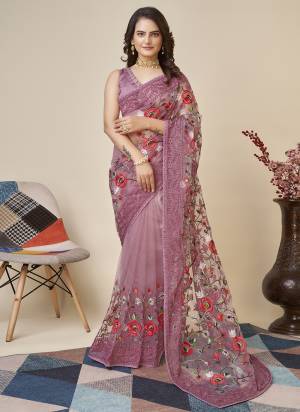 Attrective Look These Saree in Fine Colored.These Saree Are Soft Net And Blouse is Mono Banglori Fabricated.Its Beautified With Designer Multy Thread Embroidery Work.