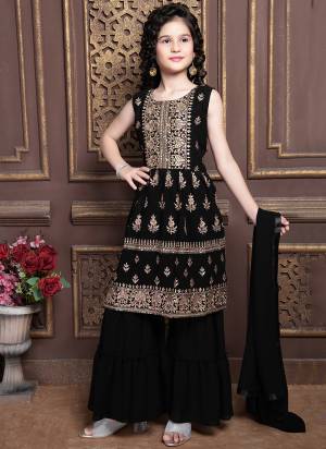 For A Designer Look,Grab These Kidswear Readymade Sharara Suits in Fine Colored.These Top And Bottom Are Fabricated On Georgette Pair With Georgette Dupatta.Its Beautified With Designer  Embroidery Work.