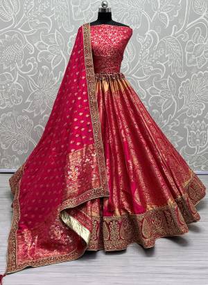 For A Fancy Designer Look,Grab These Lehenga Choli With Dupatta in Fine Colored.These Lehenga And Choli Are Banarasi Silk And Dupatta Are Fabricated On Banarasi Silk Pair.Its Beautified With Heavy Wevon Designer With Meenakari Hand Diamond Work.