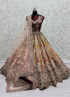 For A Fancy Designer Look,Grab These Lehenga Choli With Dupatta in Fine Colored.These Lehenga And Choli Are Velvet And Dupatta Are Fabricated On Soft Silk Pair.Its Beautified With Designer Thread,Sequance,Dori Embroidery,Zarkan Diamond Work.