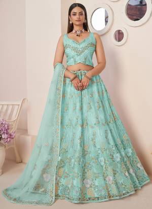 For A Fancy Designer Look,Grab These Lehenga Choli With Dupatta in Fine Colored.These Lehenga And Choli Are Net And Dupatta Are Fabricated On Net Pair.Its Beautified With Designer Sequance Embroidery,Diamond Work.