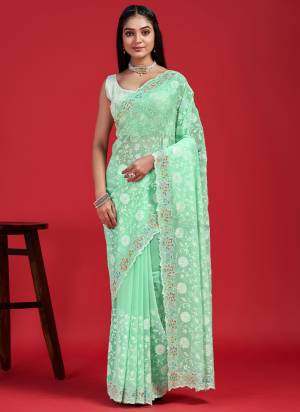 Garb These Party Wear Saree in Fine Colored.These Saree Are Georgette And Blouse is Art Silk Fabricated.Its Beautified With Designer Heavy Embroidery Work.