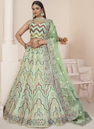 For A Fancy Designer Look,Grab These Lehenga Choli With Dupatta in Fine Colored.These Lehenga And Choli Are Net And Dupatta Are Fabricated On Net Pair.Its Beautified With Designer Thread,Sequance Embroidery,Stone Work.