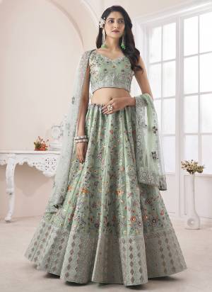 For A Fancy Designer Look,Grab These Lehenga Choli With Dupatta in Fine Colored.These Lehenga And Choli Are Art Silk And Dupatta Are Fabricated On Soft Net Pair.Its Beautified With Designer Thread,Dori Embroidery,Zarkan Work.