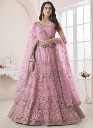 For A Fancy Designer Look,Grab These Lehenga Choli With Dupatta in Fine Colored.These Lehenga And Choli Are Soft Net And Dupatta Are Fabricated On Soft Net Pair.Its Beautified With Designer Thread,Dori,Sequance Embroidery,Zarkan Work.