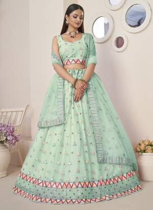 For A Fancy Designer Look,Grab These Lehenga Choli With Dupatta in Fine Colored.These Lehenga And Choli Are Net And Dupatta Are Fabricated On Net Pair.Its Beautified With Designer Thread,Sequance Embroidery Work.