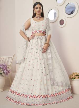 For A Fancy Designer Look,Grab These Lehenga Choli With Dupatta in Fine Colored.These Lehenga And Choli Are Net And Dupatta Are Fabricated On Net Pair.Its Beautified With Designer Thread,Sequance Embroidery Work.