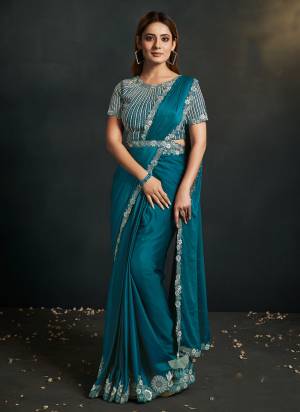 Look Attrective These Designer Party Wear Saree in Fine Light Colored.These Saree Are Satin Silk Crepe And Blouse Banglori Silk is Fabricated.Its Beautified Solid With Cord Sequance,Thread Embroidery,Additional Work.