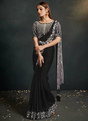 Look Attrective These Designer Party Wear Saree in Fine Light Colored.These Saree Are Satin Silk Crepe And Blouse Malai Satin is Fabricated.Its Beautified Solid With Cord Sequance,Thread Embroidery,Additional Work.