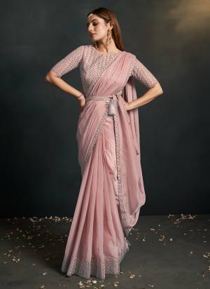 Look Attrective These Designer Party Wear Saree in Fine Light Colored.These Saree Are Organza Silk Crepe And Blouse Organza Silk is Fabricated.Its Beautified Solid With Cord Sequance,Thread Embroidery,Additional Work.