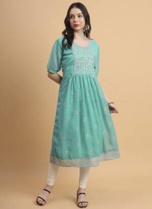 Garb These Beautiful Looking Readymade Long Kurti.These Kurti is Fabricated On Georgette.Its Beautified With Designer Thread Embroidery Work.