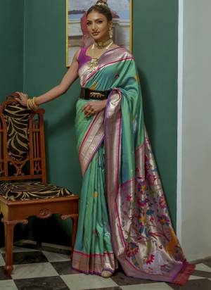 Garb These Festive Wear Saree in Fine Colored.These Saree And Blouse is Fabricated On Soft Paithani Silk.Its Beautified With Handloom Weavon Jari Designer.