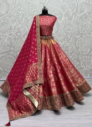 For A Fancy Designer Look,Grab These Lehenga Choli With Dupatta in Fine Colored.These Lehenga And Choli Are Banarasi Silk And Dupatta Are Fabricated On Banarasi Silk Pair.Its Beautified With Wevon Designer With Meenakari Hand  Diamond Work.