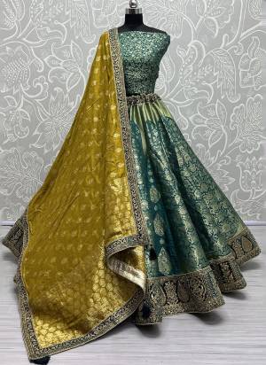 For A Fancy Designer Look,Grab These Lehenga Choli With Dupatta in Fine Colored.These Lehenga And Choli Are Banarasi Silk And Dupatta Are Fabricated On Banarasi Silk Pair.Its Beautified With Wevon Designer With Meenakari Hand  Diamond Work.