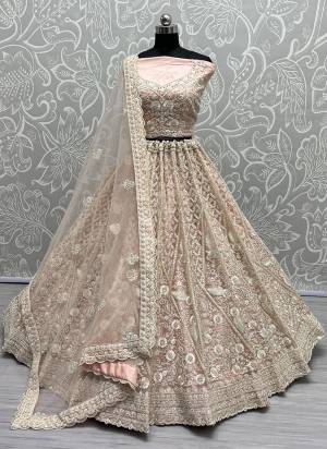 For A Fancy Designer Look,Grab These Lehenga Choli With Dupatta in Fine Colored.These Lehenga And Choli Are Net And Dupatta Are Fabricated On Soft Net Pair.Its Beautified With Designer Thread,Dori Embroidery, Diamond Work.