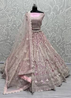 For A Fancy Designer Look,Grab These Lehenga Choli With Dupatta in Fine Colored.These Lehenga And Choli Are Net And Dupatta Are Fabricated On Soft Net Pair.Its Beautified With Designer Thread,Dori Embroidery, Diamond Work.