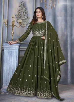 Green colored suit is prettified with sequins embroidery work as shown which makes it appear classy. This top is made of georgette fabric which is accompanied with santoon bottom, Santoon inner and georgette dupatta. Women can buy this suit to wear for their parties, festive, functions and events.