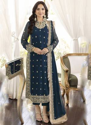 Blue colored pakistani suit is prettified with thread work as shown which makes it appear classy. This top is made of georgette fabric which is accompanied with santoon bottom, santoon lining and Georgette dupatta. Women can buy this suit to wear for their parties, functions and event.