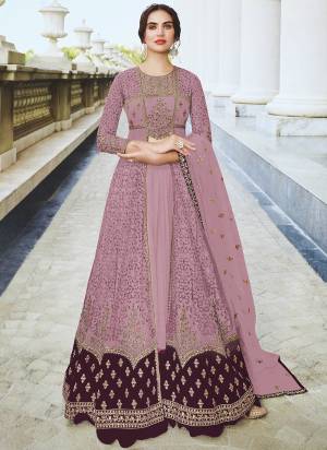 This Pink colored anarkali suit is beautifully Embroidery Work, Diamond Work and sequins work as shown. This net anarkali suit comes along with semi stitched Santoon bottom, Santoon Inner and net dupatta which makes it appear more adorning. Women can buy this suit to wear for their party, sangeet, homely events and ideal for any fashionista.