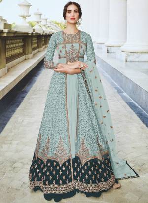 This Sky colored anarkali suit is beautifully Embroidery Work, Diamond Work and sequins work as shown. This net anarkali suit comes along with semi stitched Santoon bottom, Santoon Inner and net dupatta which makes it appear more adorning. Women can buy this suit to wear for their party, sangeet, homely events and ideal for any fashionista.