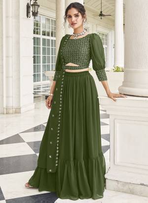 Garb This Partywear Lahenga Blouse With Dupatta Are Fine Colored.These Designer Blouse Lahenga And Dupatta Fabric Are Faux Georgette In Fabricated Beautified With Attrective Thread,Sequance Embroidery Work. Buy Now.