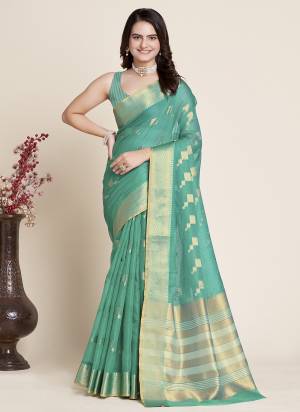 Attrective This Partywear Saree Paired With Blouse.This Saree And Blouse Are Kota Doriya Silk Based Fabric With Weaving Jacquard Jari Designer. Buy This Pretty Saree Now.