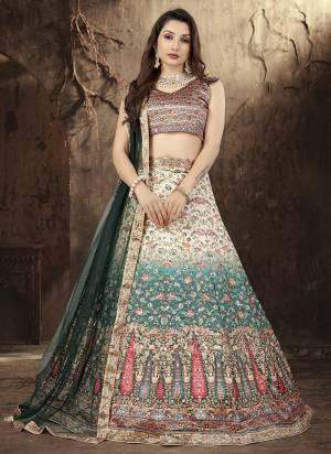 For A Designer Look,Grab These Lehenga Choli in Fine Colored.These Lehenga And Blouse Are Fabricated On Satin Pair With Butterfly Net Dupatta.Its Beautified With Designer Printed,Antique Mirror Work.