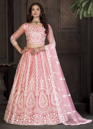 Grab These Lehenga Choli in Fine Colored.These Lehenga Are Net And Blouse Are Net And Dupatta Are Fabricated On Net Pair.Its Beautified With Designer Embroidery Work.