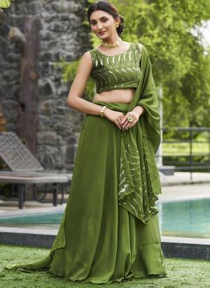 Grab These Lehenga Choli in Fine Colored.These Lehenga Are Rangoli Silk And Blouse Are Rangoli Silk And Dupatta Are Fabricated On Rangoli Silk Pair.Its Beautified With Designer Embroidery Work.