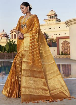 Attrective Look These Festive Wear Saree in Fine Colored.These Saree And Blouse is Fabricated On Organza.Its Beautified With Heavy Weaving Jari Designer.