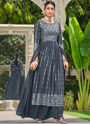 Garb These Readymade Plazzo Suit in Fine Colored Pair With Bottom And Dupatta.These Top And Dupatta Are Fabricated On Faux Georgette Pair With Faux Georgette Bottom.Its Beautified With Designer Heavy Sequance Embroidery Work.