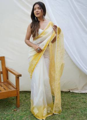 Attrective Looking These Party Wear Saree in Fine Colored.These Saree Are Organza And Blouse is Fabricated On Art Silk.Its Beautified With Designer Thread Embroidery Work.