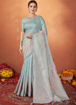 Look Attrective These Designer Party Wear Saree in Fine Light Colored.These Saree Are Tusser Silk And Blouse Silk Crepe is Fabricated.Its Beautified Wevon Jacquard Designer With Embroidery Work.