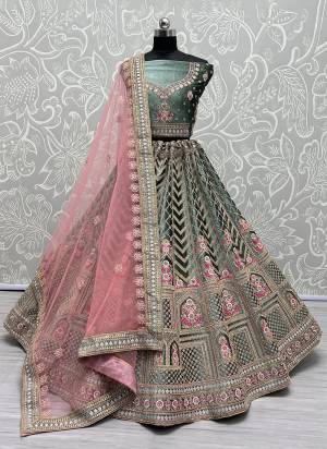 For A Fancy Designer Look,Grab These Lehenga Choli With Dupatta in Fine Colored.These Lehenga And Choli Are Velvet And Dupatta Are Fabricated On Soft Net Pair.Its Beautified With Designer Thread Embroidery, Diamond Work.