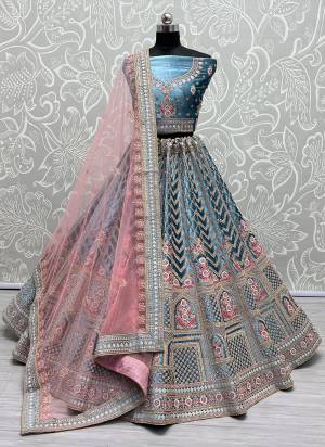 For A Fancy Designer Look,Grab These Lehenga Choli With Dupatta in Fine Colored.These Lehenga And Choli Are Velvet And Dupatta Are Fabricated On Soft Net Pair.Its Beautified With Designer Thread Embroidery, Diamond Work.