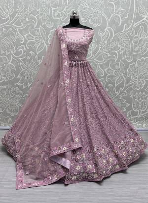 For A Fancy Designer Look,Grab These Lehenga Choli With Dupatta in Fine Colored.These Lehenga And Choli Are Net And Dupatta Are Fabricated On Soft Net Pair.Its Beautified With Designer Thread,Sequance,Dori Embroidery, Diamond Work.