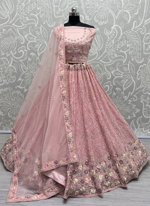 For A Fancy Designer Look,Grab These Lehenga Choli With Dupatta in Fine Colored.These Lehenga And Choli Are Net And Dupatta Are Fabricated On Soft Net Pair.Its Beautified With Designer Thread,Sequance,Dori Embroidery, Diamond Work.